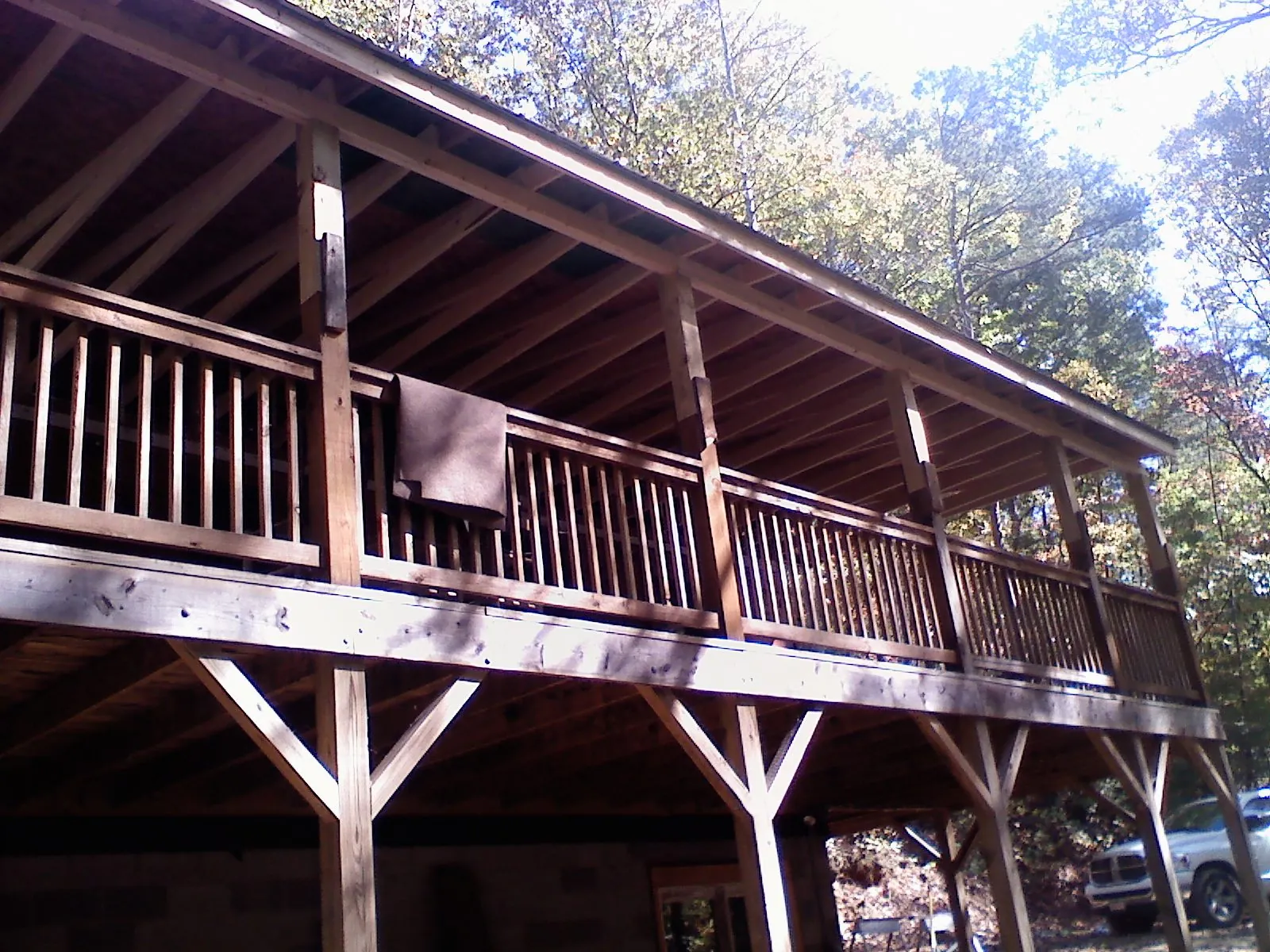 Timber framing under a new elevated porch and deck — Roof Leak Repair in Hebron by Roofing Brothers